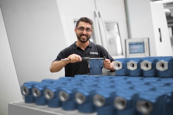 Powder-coated filter housings undergoing final inspection