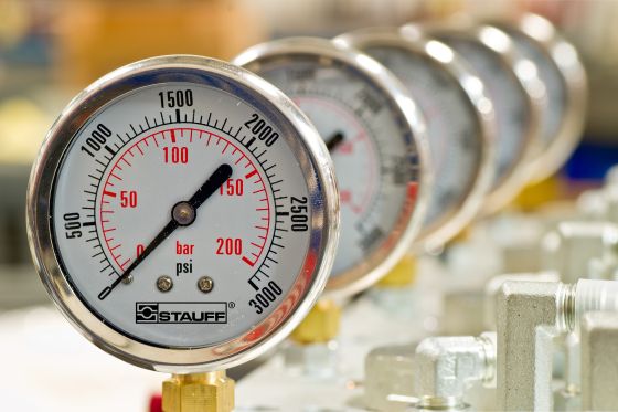Several pressure gauges in a row