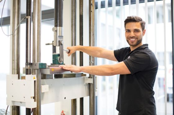 Man tightening a bolt