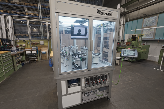 STAUFF poppet valve assembly machine built in-house