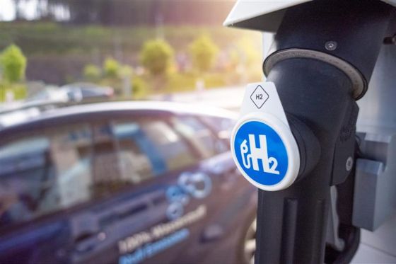 Fuel pump with hydrogen symbol on it